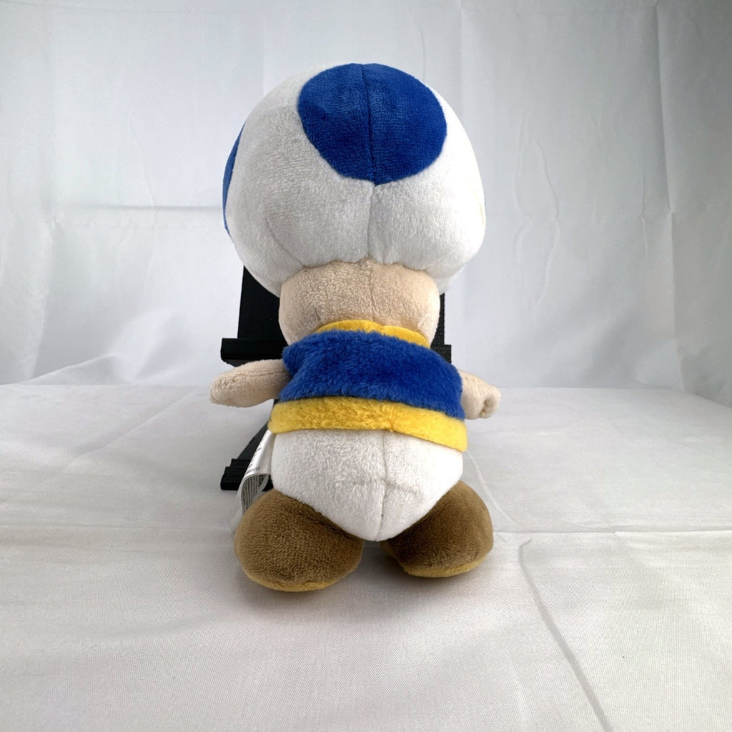 Nintendo Super Mario Bros. Blue Toad 7-inch plush toy with blue vest and spotted cap