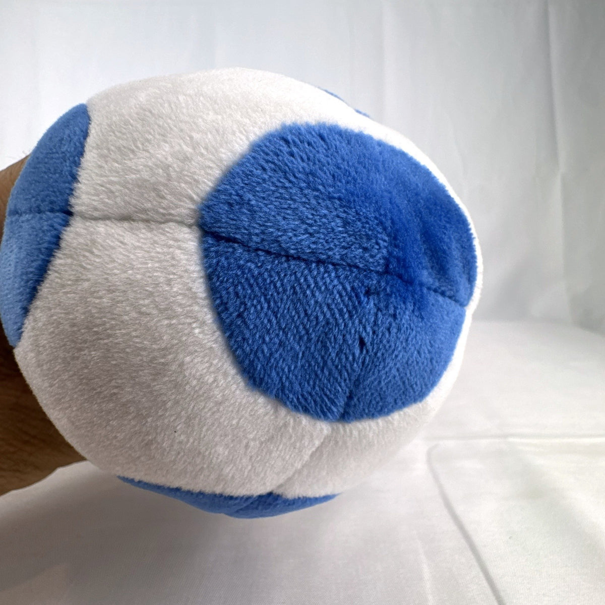 Nintendo Super Mario Bros. Blue Toad 7-inch plush toy with blue vest and spotted cap