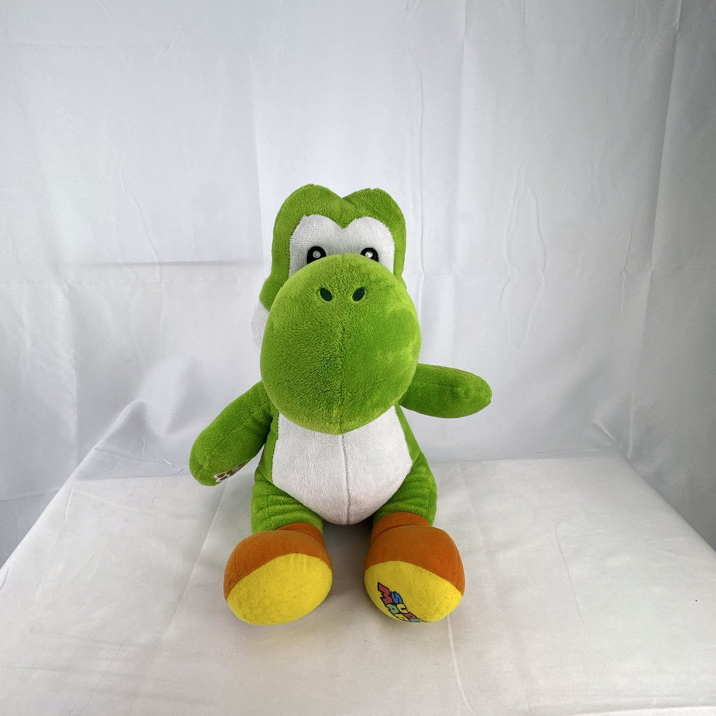 Build-A-Bear Workshop 16-inch green Yoshi plush featuring red shell and embroidered foot patch