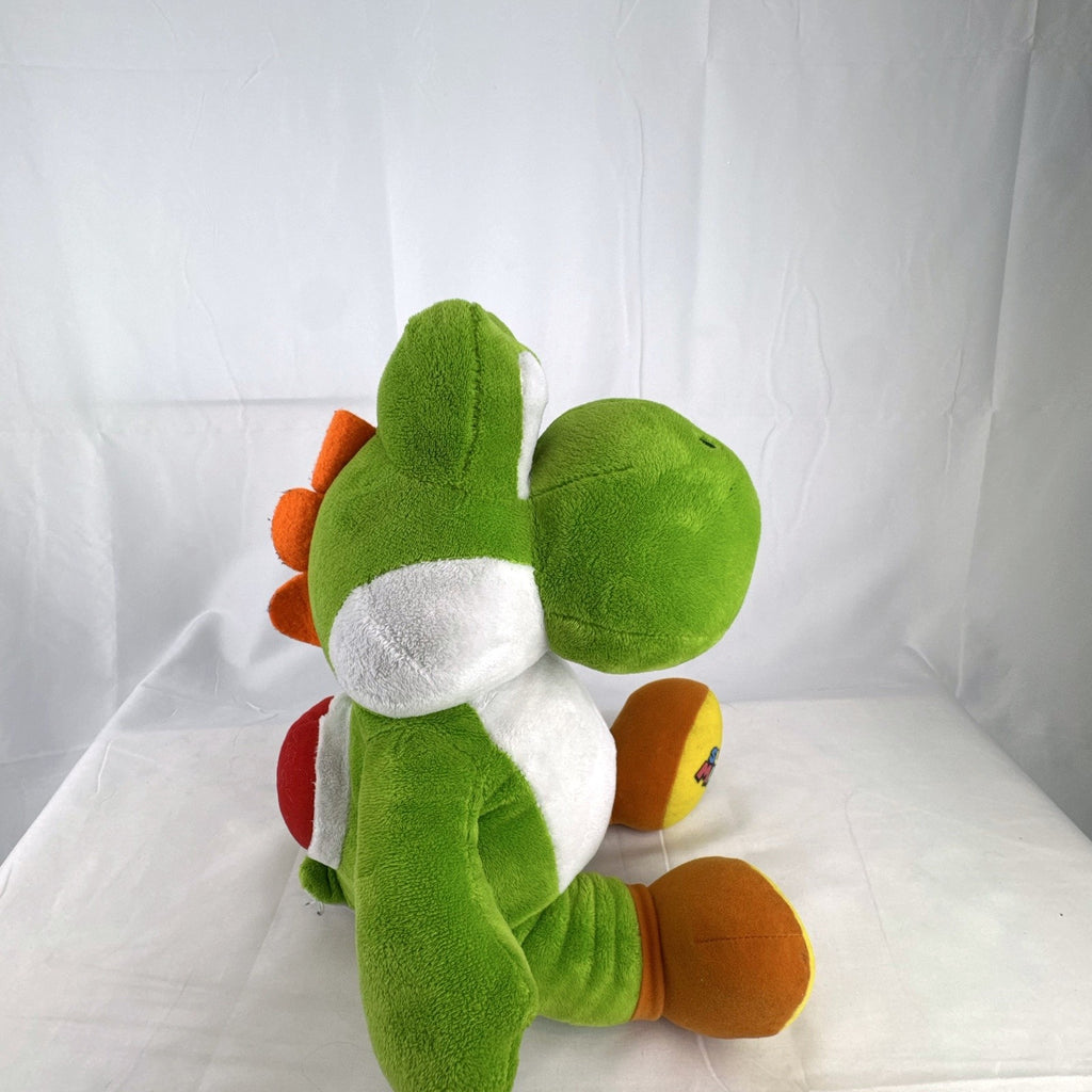 Build-A-Bear Workshop 16-inch green Yoshi plush featuring red shell and embroidered foot patch