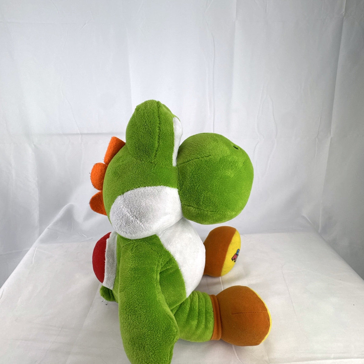 Build-A-Bear Workshop 16-inch green Yoshi plush featuring red shell and embroidered foot patch