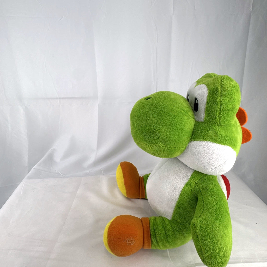Build-A-Bear Workshop 16-inch green Yoshi plush featuring red shell and embroidered foot patch