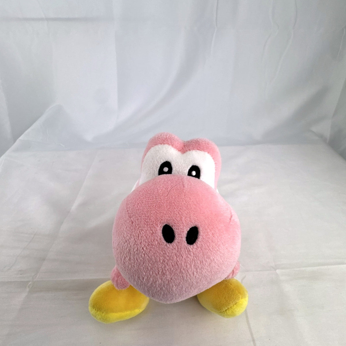Nintendo Super Mario pink Yoshi small plush toy with red shell and yellow shoes