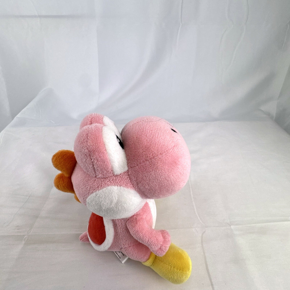 Nintendo Super Mario pink Yoshi small plush toy with red shell and yellow shoes