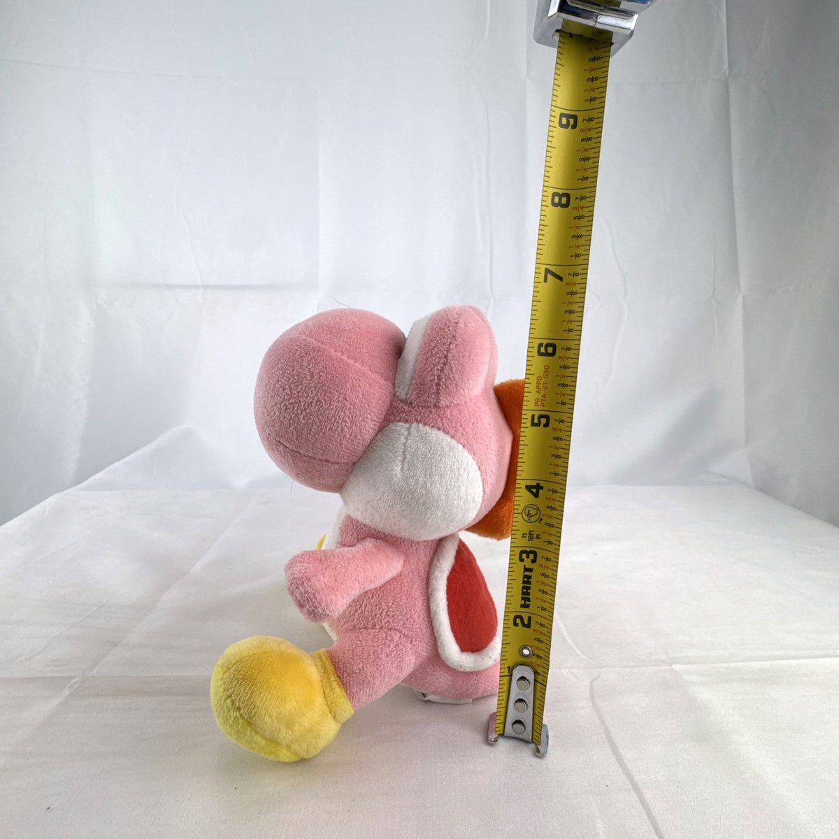 Nintendo Super Mario pink Yoshi small plush toy with red shell and yellow shoes