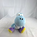 San-ei Nintendo light blue Yoshi plush stuffed animal showing red saddle shell and purple shoes