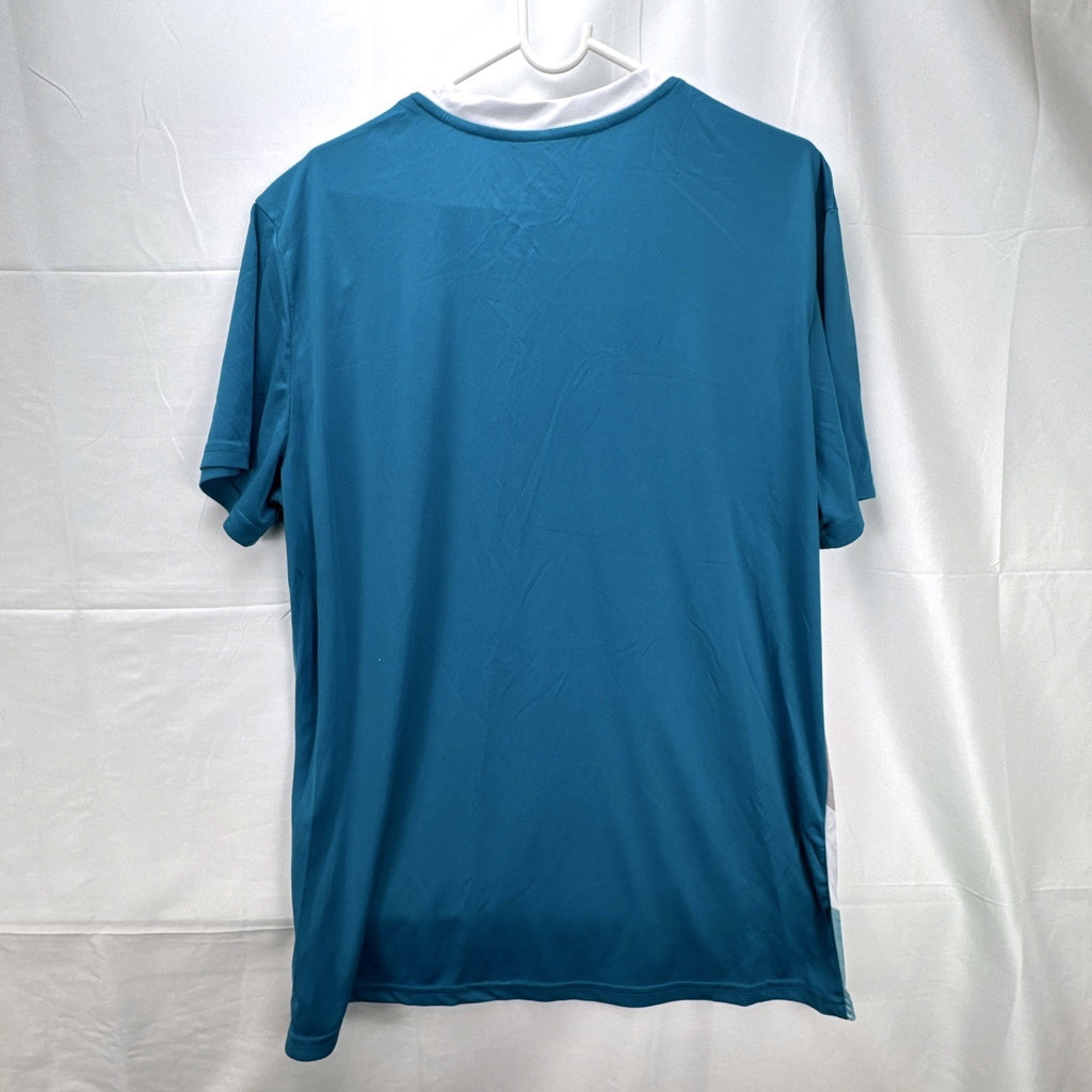 Real Madrid official men's size large soccer jersey in teal blue chevron pattern