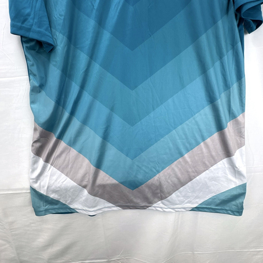 Real Madrid official men's size large soccer jersey in teal blue chevron pattern