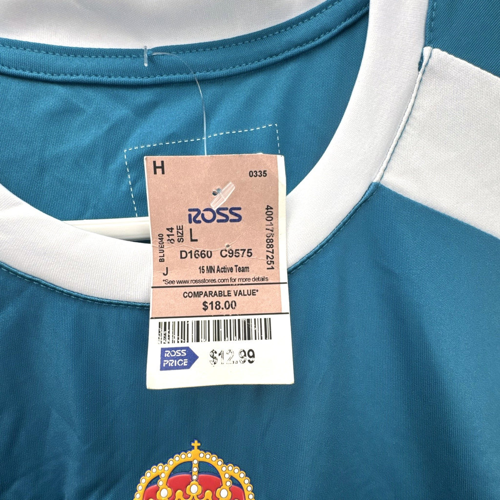 Real Madrid official men's size large soccer jersey in teal blue chevron pattern