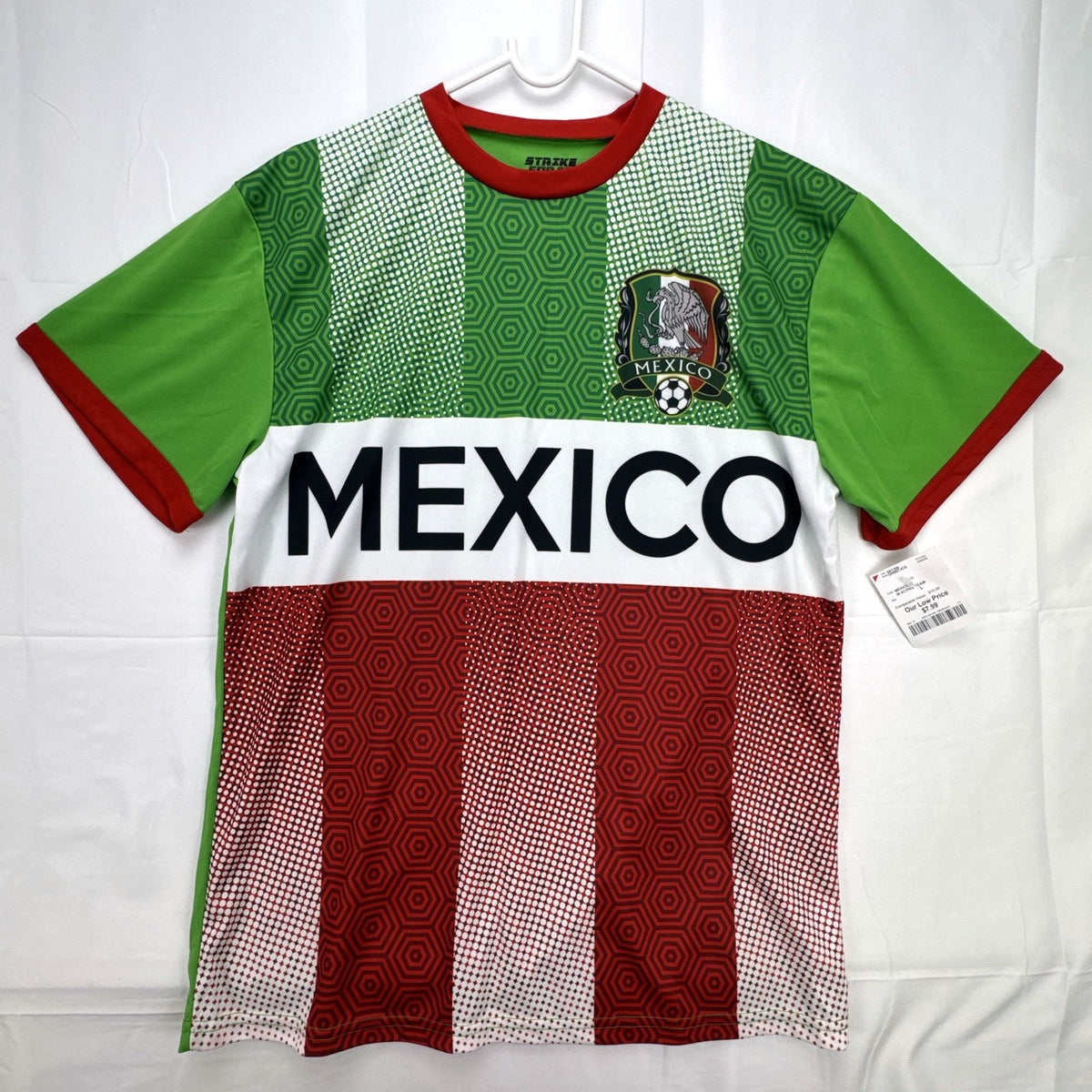 Front view of new Strike Force Mexico national soccer team jersey in green geometric print, men's size large