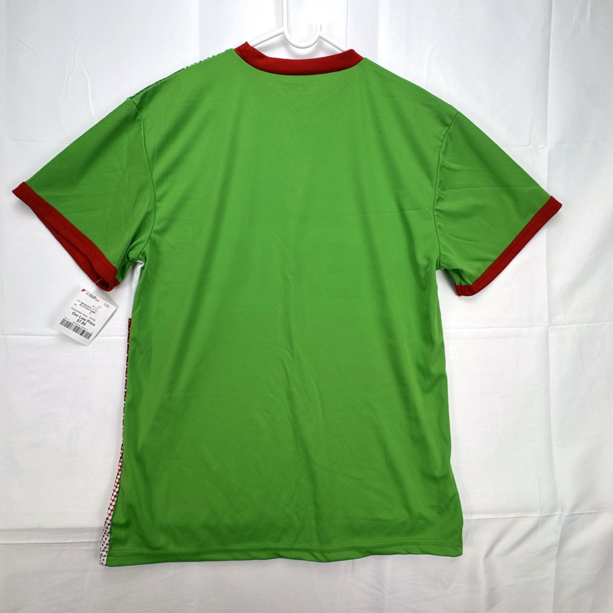 Front view of new Strike Force Mexico national soccer team jersey in green geometric print, men's size large