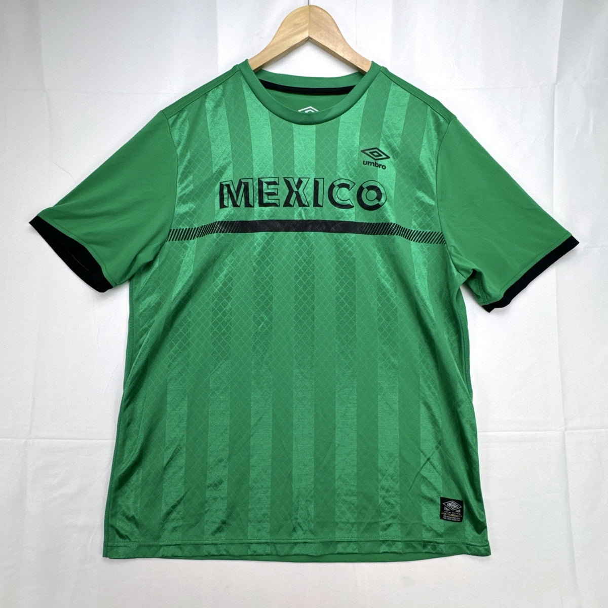 Green Umbro Mexico national team soccer jersey with black trim in men's size Large