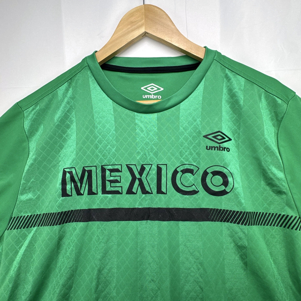 Green Umbro Mexico national team soccer jersey with black trim in men's size Large
