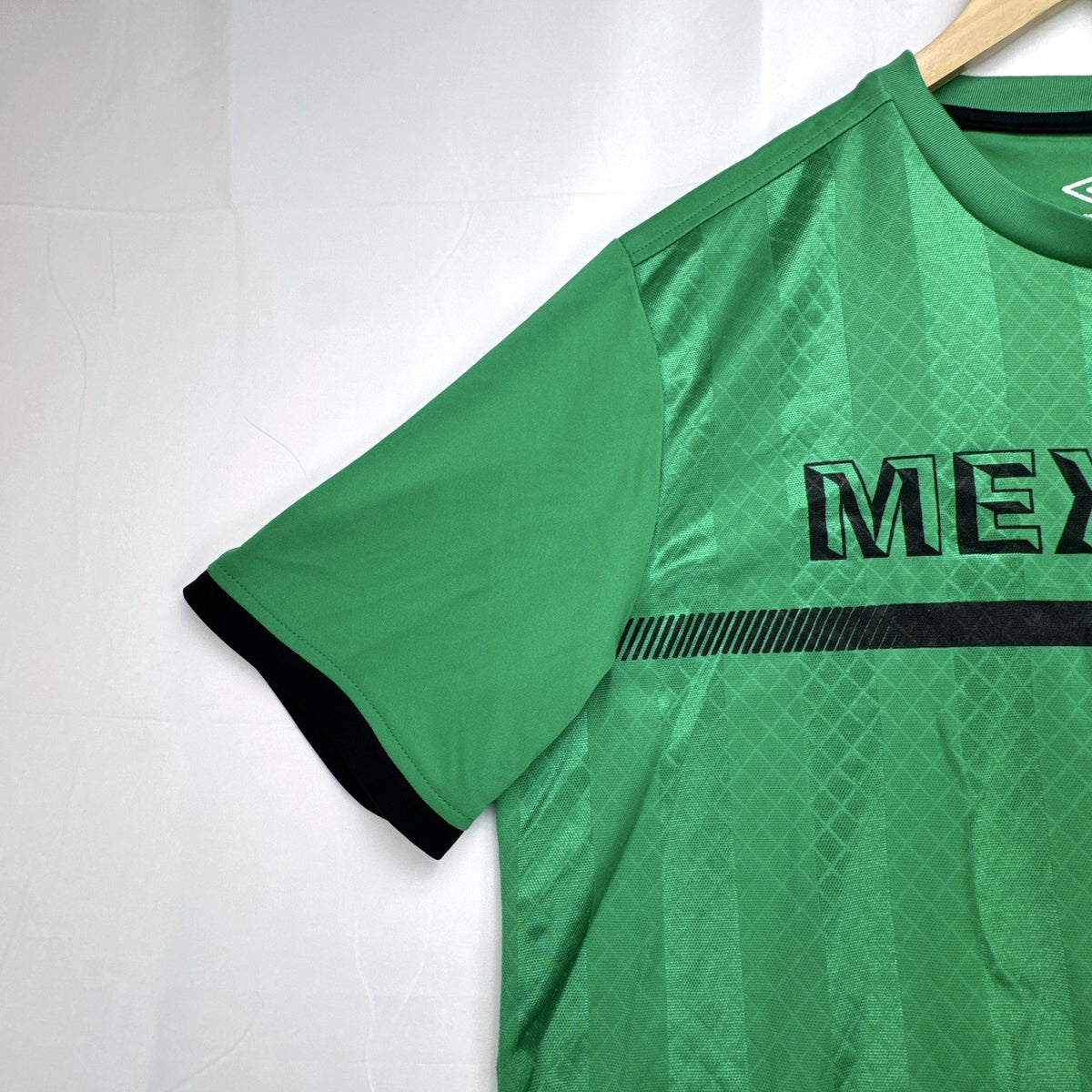 Green Umbro Mexico national team soccer jersey with black trim in men's size Large