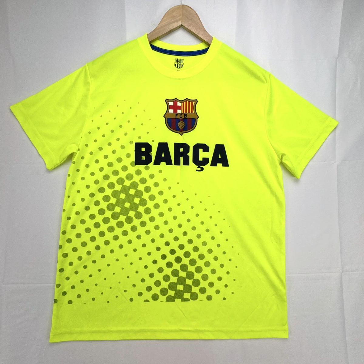 FC Barcelona neon yellow short sleeve soccer jersey with Barça crest graphic in men's size large