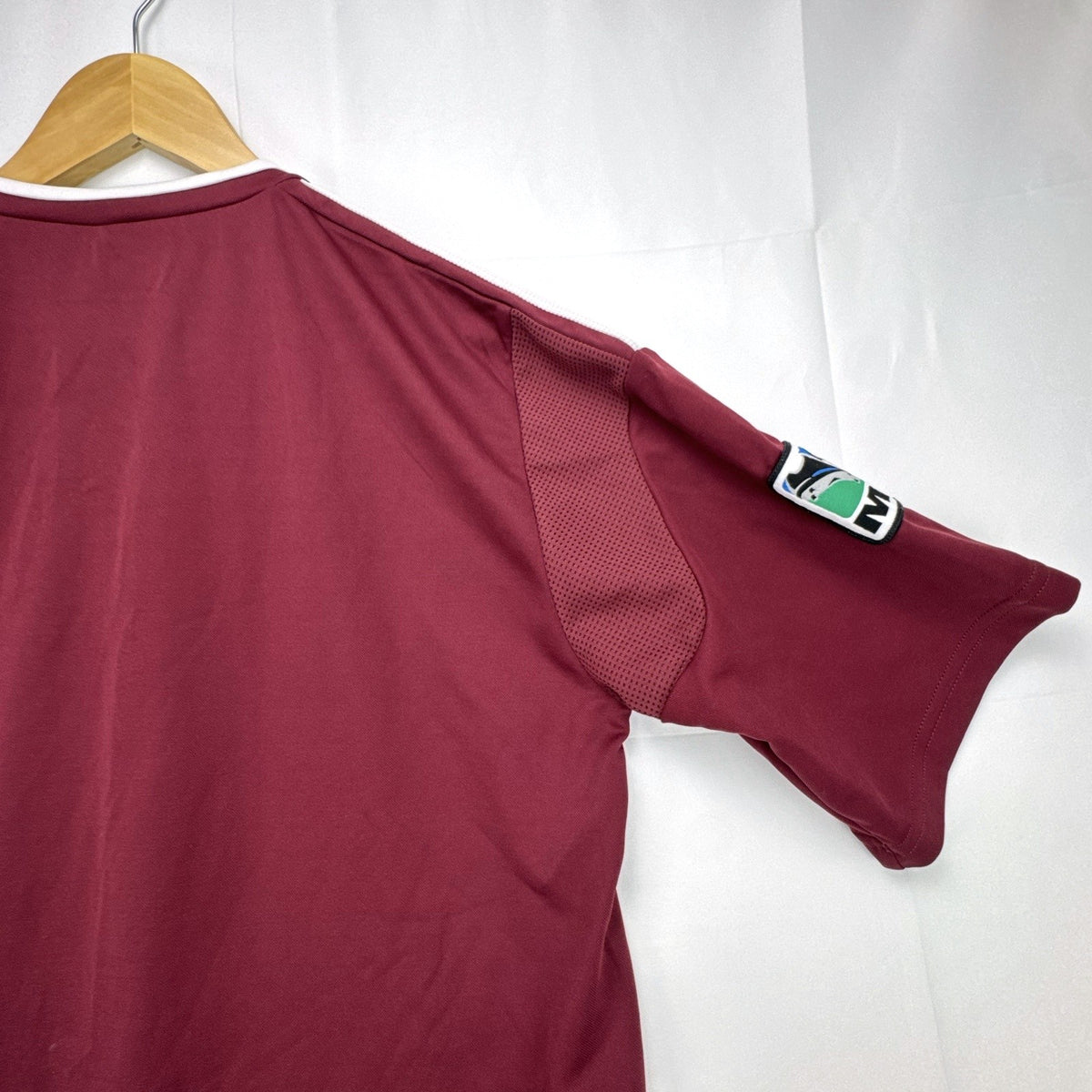 Men's size Large burgundy adidas MLS training soccer jersey with white stripes and league patch