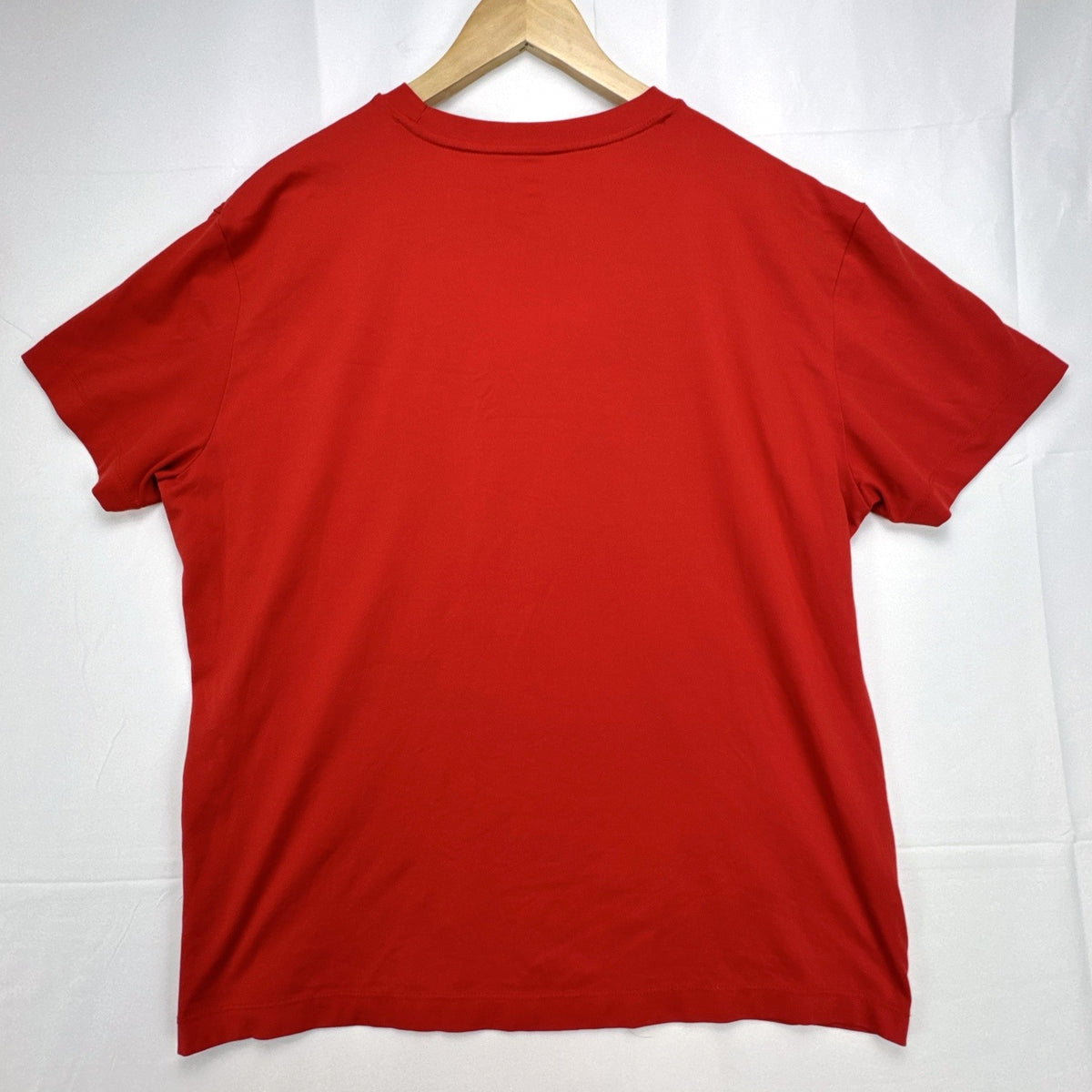 Manchester United men's XL red graphic t-shirt featuring the club crest and bold MAN UTD chest print.