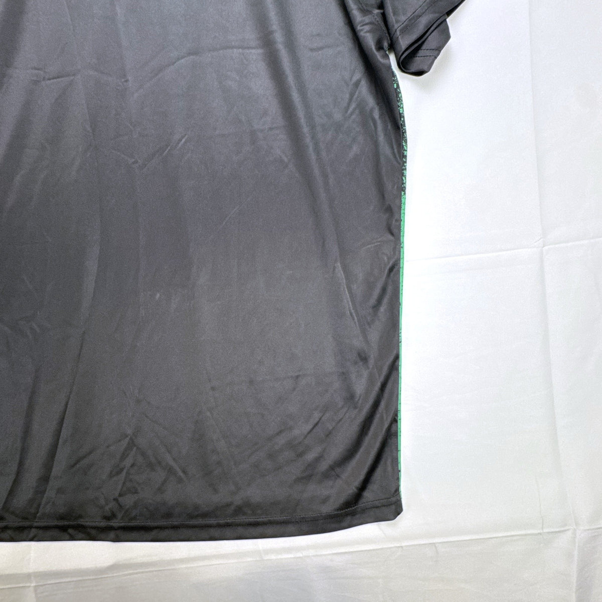 Mitre Mexico soccer jersey in black with green geometric print and red trim, men's size XL.