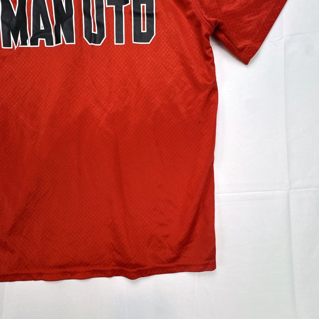Manchester United men's red soccer jersey in size XL with chest crest and diamond knit pattern