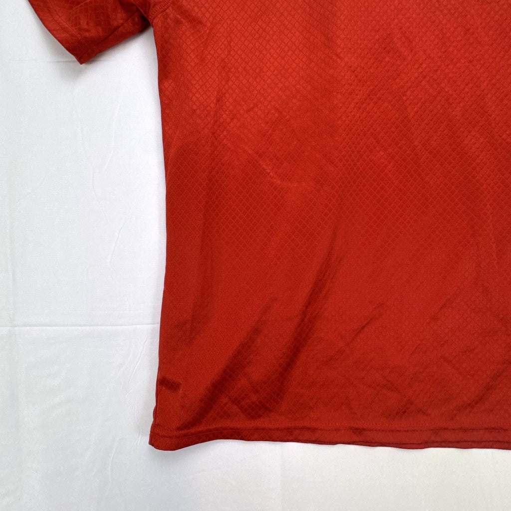 Manchester United men's red soccer jersey in size XL with chest crest and diamond knit pattern
