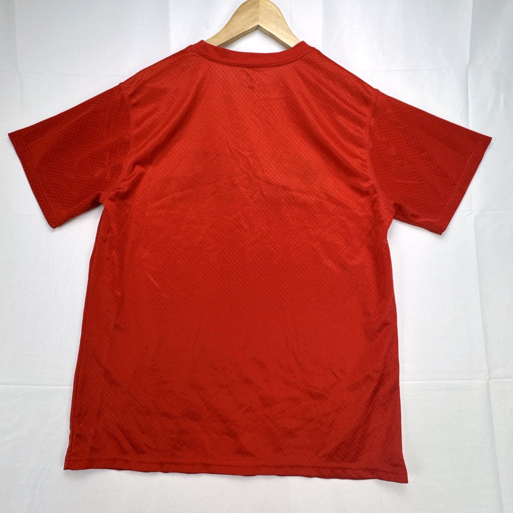 Manchester United men's red soccer jersey in size XL with chest crest and diamond knit pattern