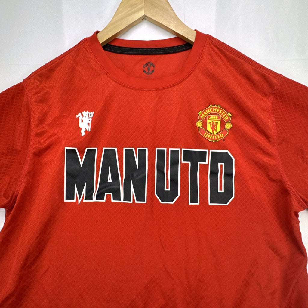 Manchester United men's red soccer jersey in size XL with chest crest and diamond knit pattern