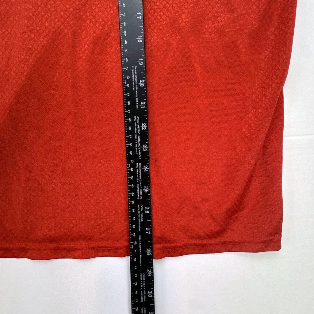 Manchester United men's red soccer jersey in size XL with chest crest and diamond knit pattern