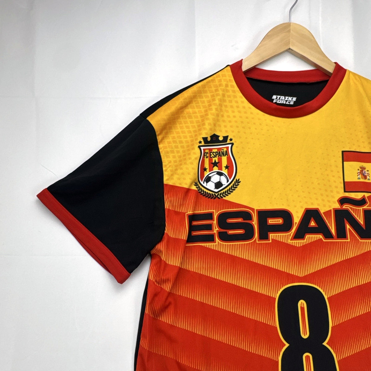 Strike Force Spain #8 soccer jersey in red, yellow, and black chevron print, men's size large