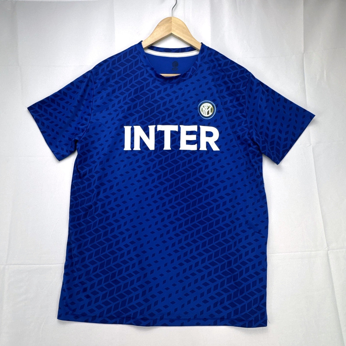 Inter Milan official blue short-sleeve soccer jersey for men, size large with team crest