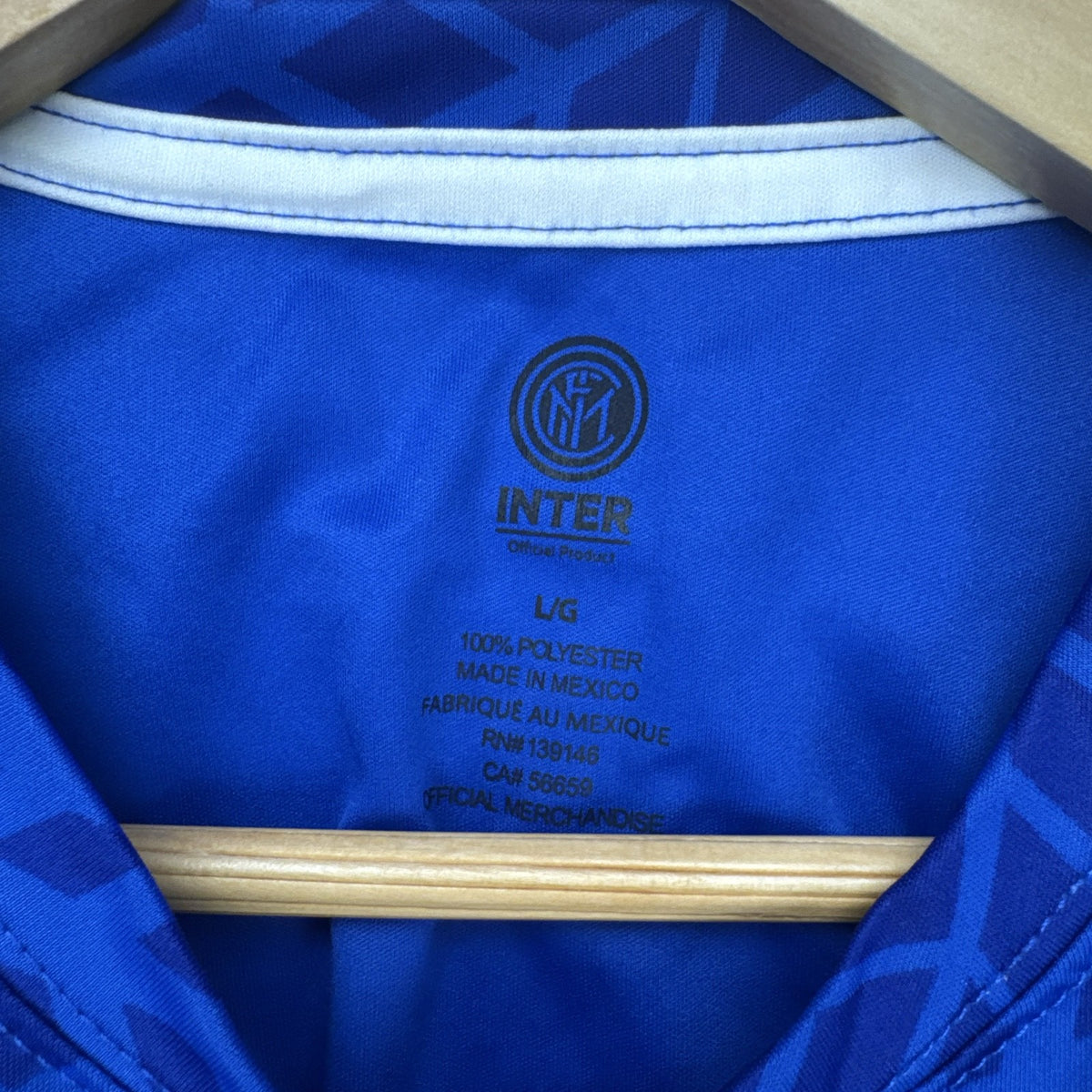 Inter Milan official blue short-sleeve soccer jersey for men, size large with team crest