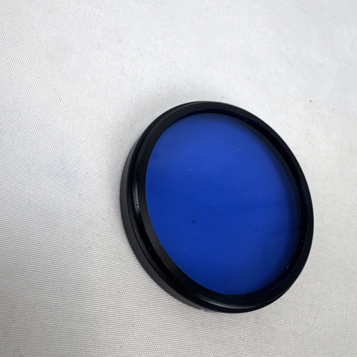 Tiffen 52mm 80A blue color conversion camera lens filter with threaded metal ring
