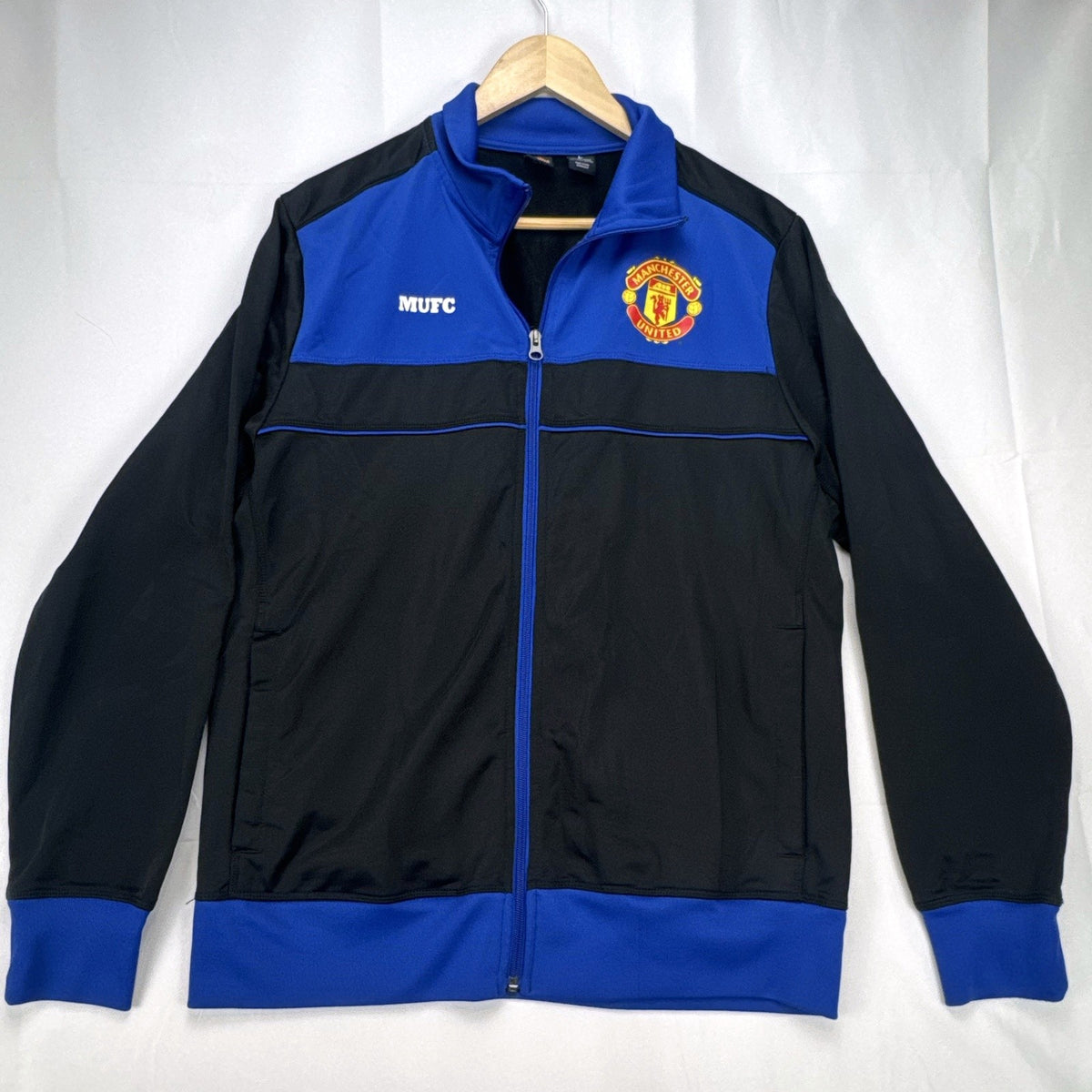 Manchester United men's full-zip soccer warmup track jacket in black and blue, size large