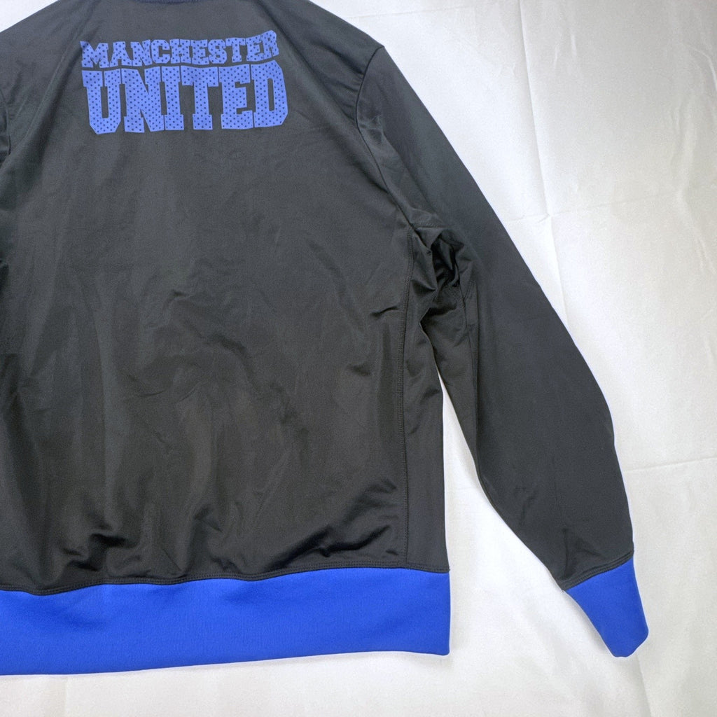 Manchester United men's full-zip soccer warmup track jacket in black and blue, size large