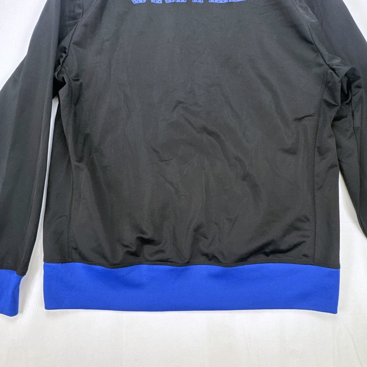 Manchester United men's full-zip soccer warmup track jacket in black and blue, size large