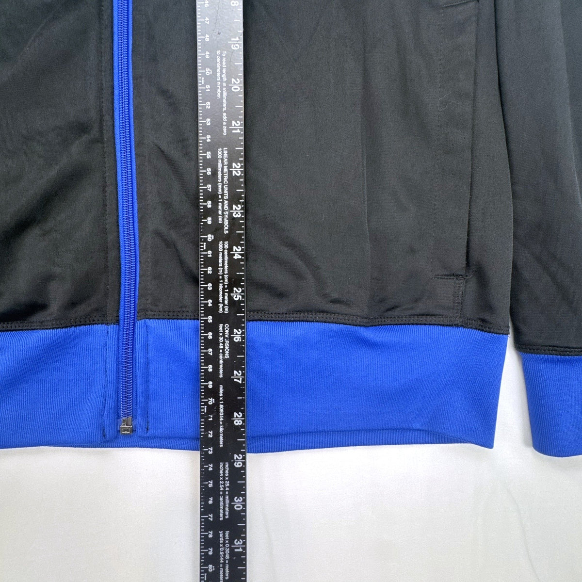 Manchester United men's full-zip soccer warmup track jacket in black and blue, size large