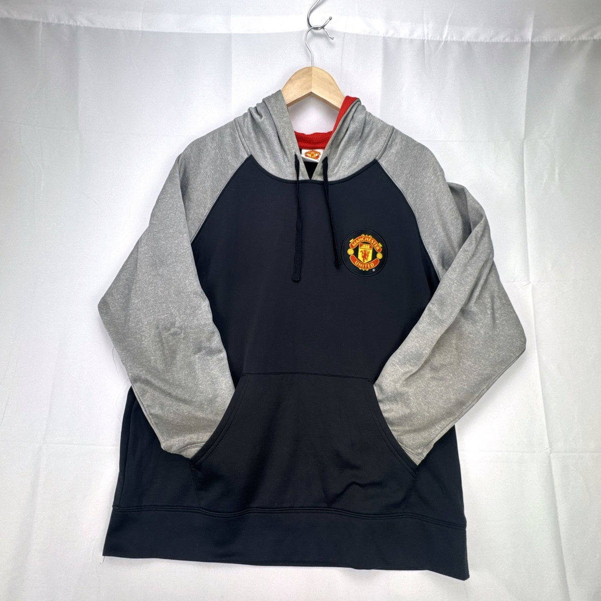 Manchester United men's large black and gray raglan pullover hoodie with embroidered chest crest