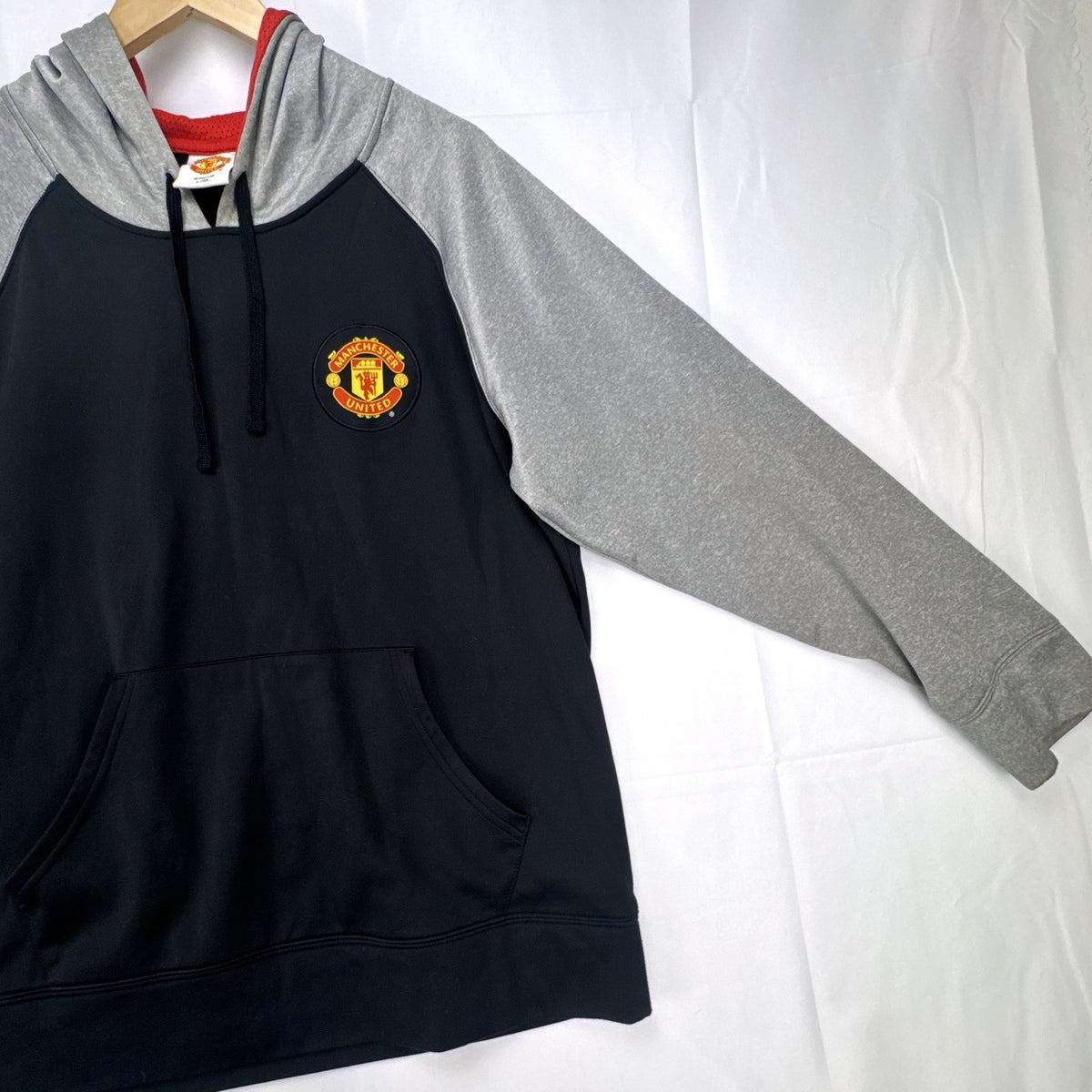 Manchester United men's large black and gray raglan pullover hoodie with embroidered chest crest