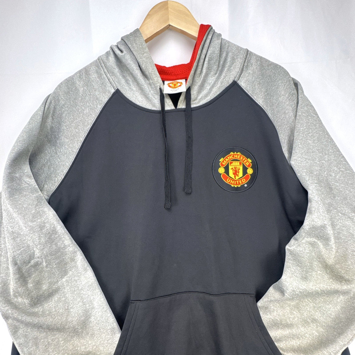Manchester United men's large black and gray raglan pullover hoodie with embroidered chest crest