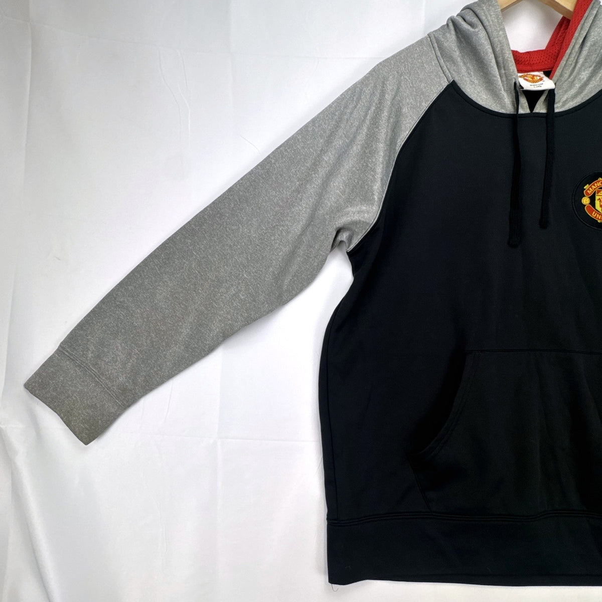 Manchester United men's large black and gray raglan pullover hoodie with embroidered chest crest