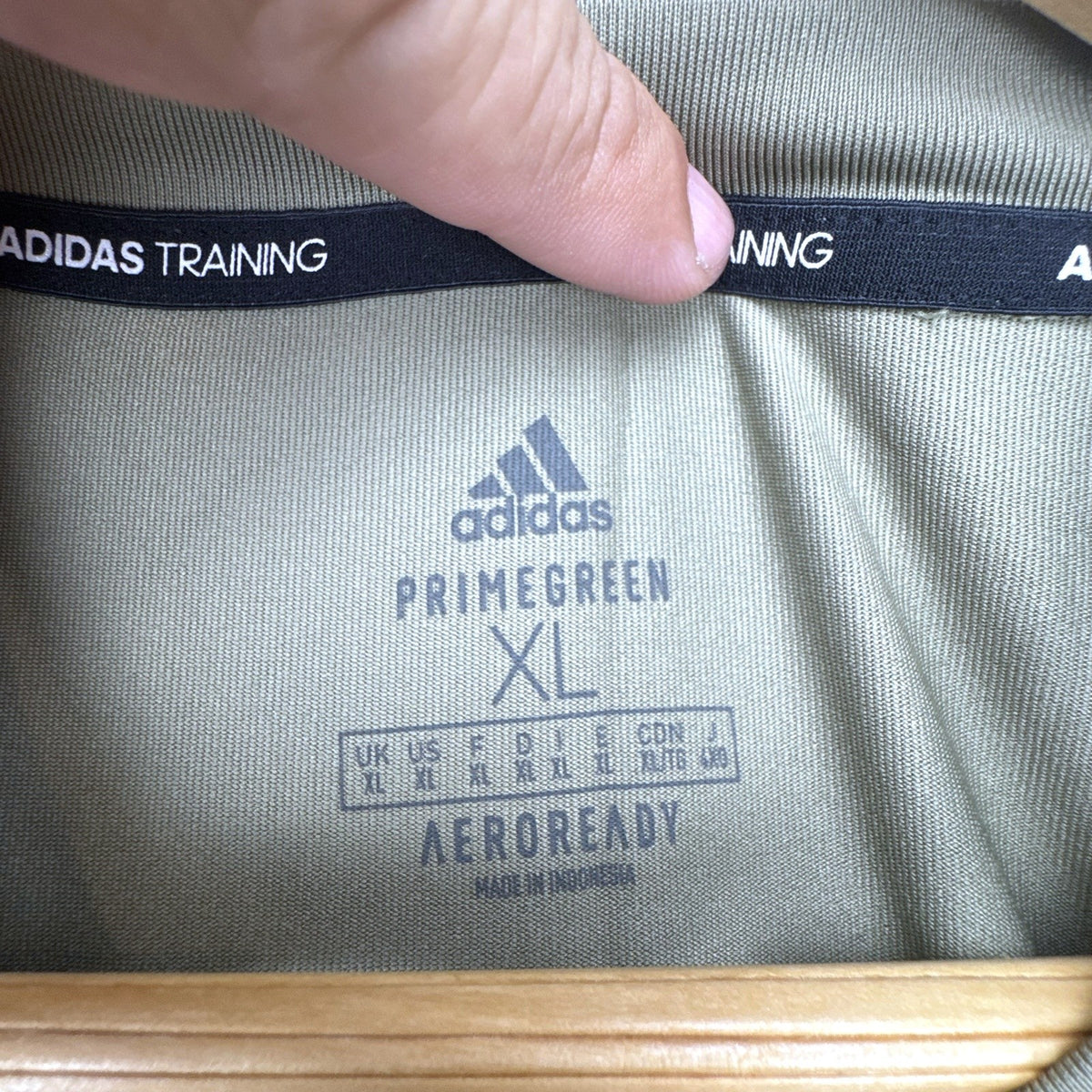 Men's adidas AEROREADY olive green training t-shirt with black side panels, size XL.