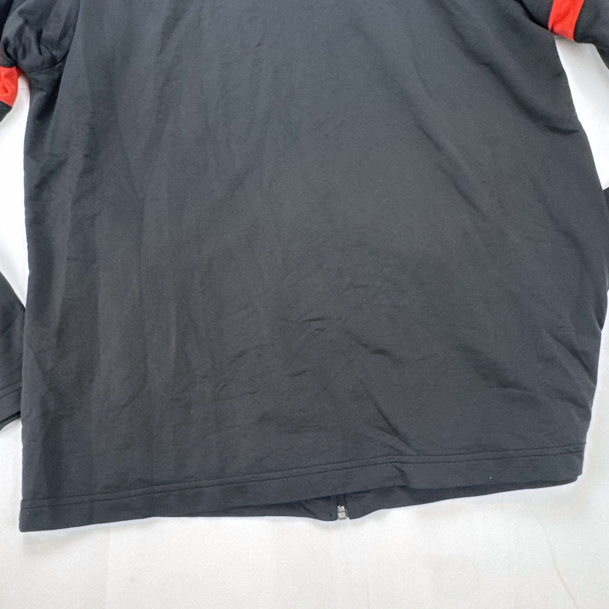 Manchester United men's large full-zip track jacket in black and red with embroidered club crest