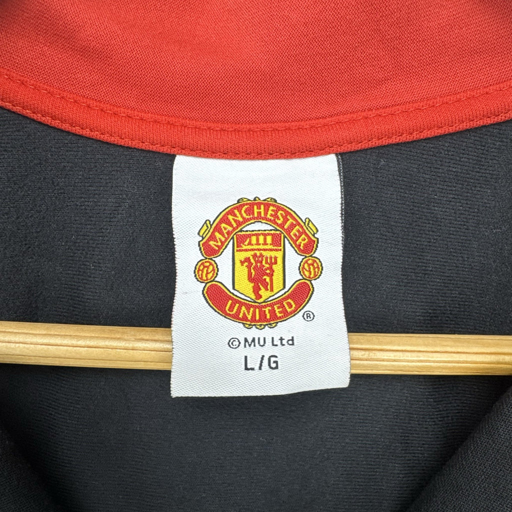 Manchester United men's large full-zip track jacket in black and red with embroidered club crest