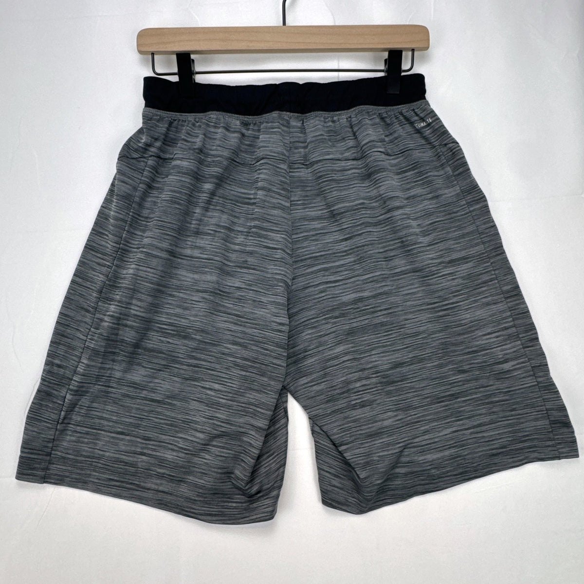Men's small adidas Climalite athletic shorts in heather gray with black elastic waistband and side pockets.