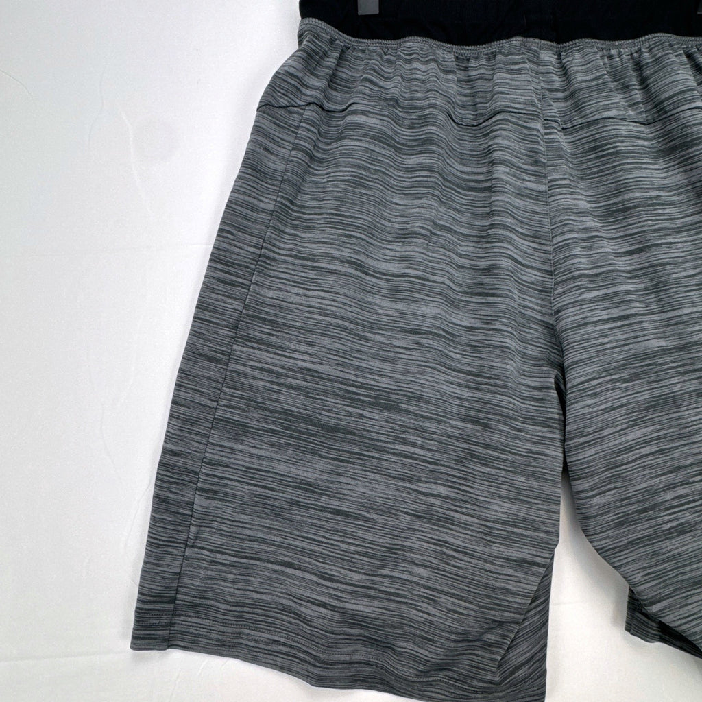 Men's small adidas Climalite athletic shorts in heather gray with black elastic waistband and side pockets.