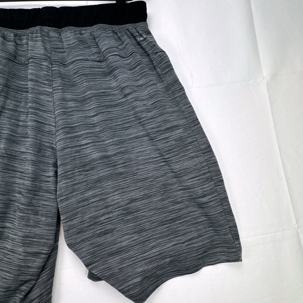 Men's small adidas Climalite athletic shorts in heather gray with black elastic waistband and side pockets.