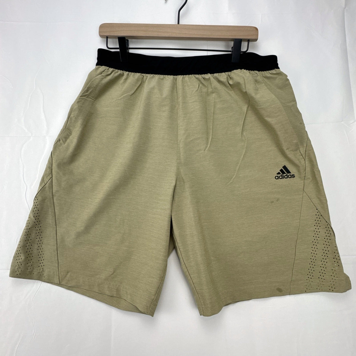 Adidas men's heather beige athletic training shorts in size medium with black elastic waistband and side vents