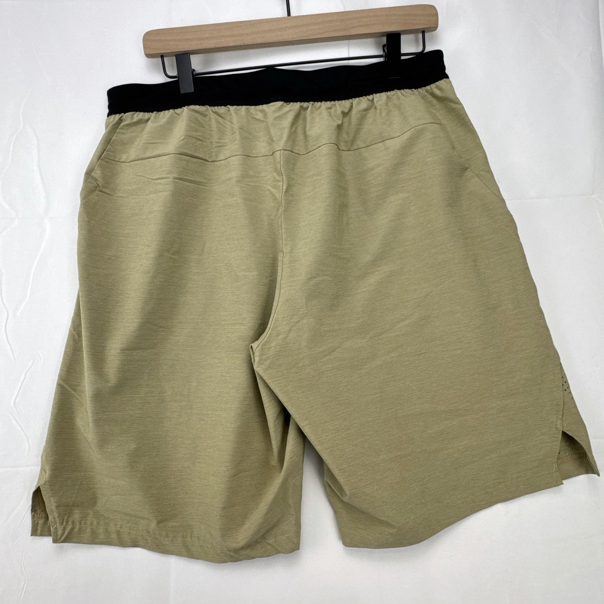 Adidas men's heather beige athletic training shorts in size medium with black elastic waistband and side vents