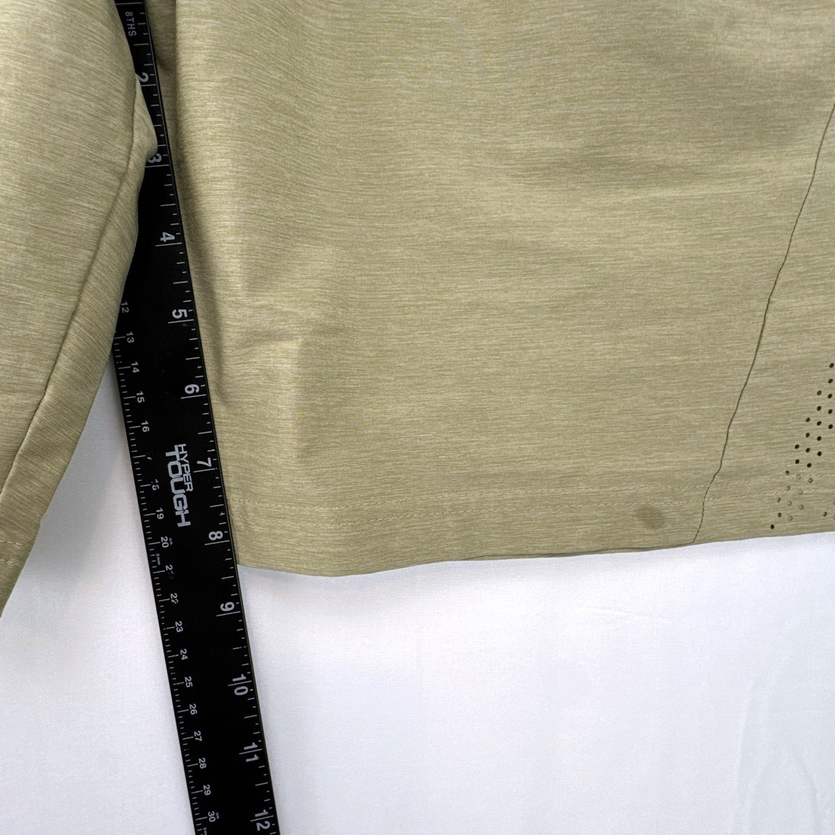Adidas men's heather beige athletic training shorts in size medium with black elastic waistband and side vents