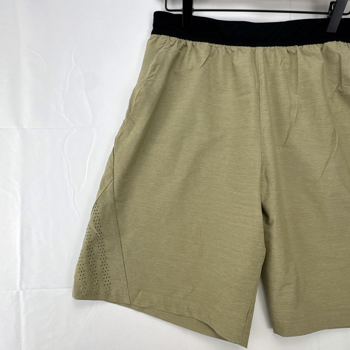 Adidas men's heather beige athletic training shorts in size medium with black elastic waistband and side vents