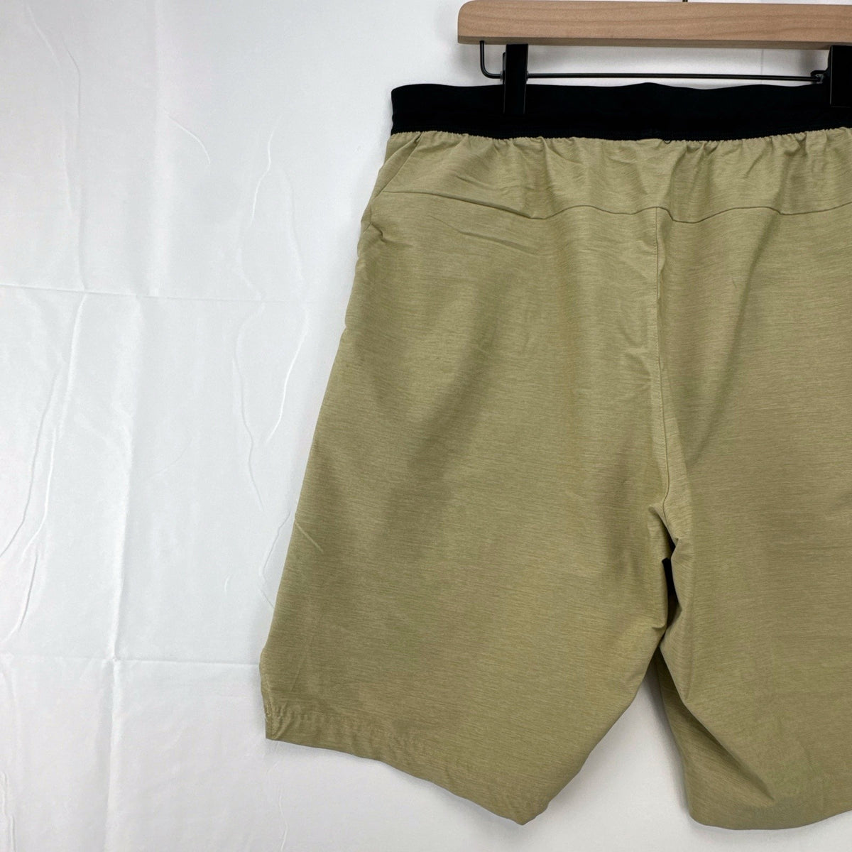 Adidas men's heather beige athletic training shorts in size medium with black elastic waistband and side vents